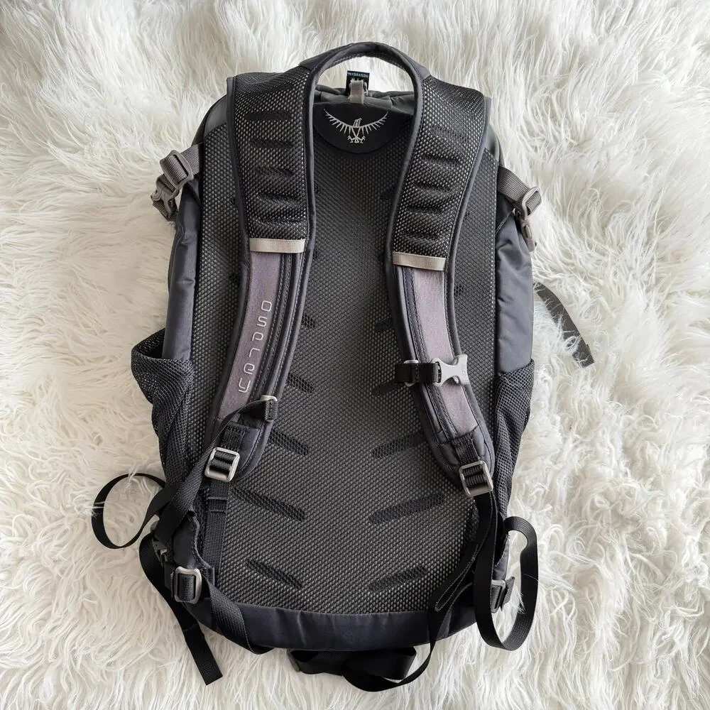 Osprey Daylite Plus Backpack in Black featuring a front stash pocket - Picture 8 of 14